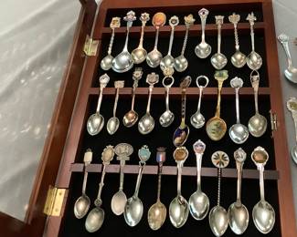 Souvenir spoons with hanging glass front case