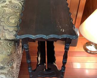 Scalloped top table with book holder