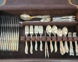 Several sets of sterling silver flatware