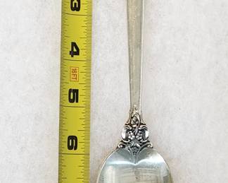 8 3/4" sterling silver serving spoon in the Grande Baroque pattern, designed by William S. Warren and introduced in 1941 by Wallace Silver Company.