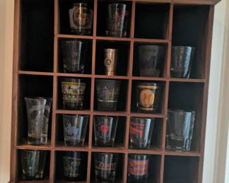 Shelf Of Shot Glasses
