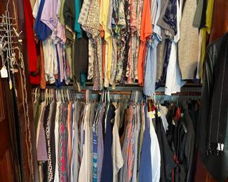 Men's and ladies closets are full to the brim with nice clothing.