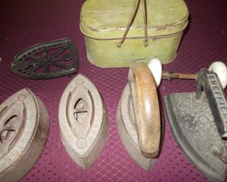 Antique irons and tin lunch box 