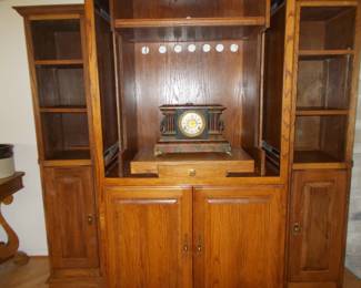 Entertainment center with detachable side pieces