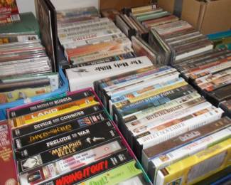 VHS CDs CASSETTES DVDs