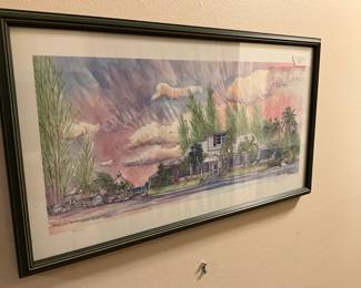 Framed & matted picture under glass in hallway