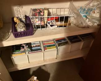 Bottom 2 shelves of games closet