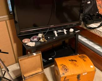 TV, TV stand, boxes 