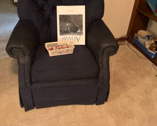 Blue chair in Living room with miscellaneous 