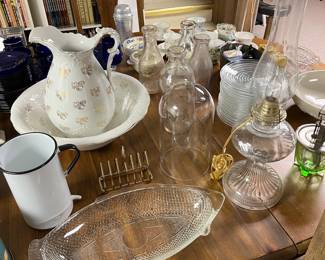 Extensive selection of vintage glassware and pottery.