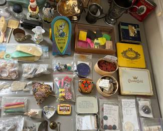 Hundreds of “smalls” (small collectibles), including vintage tins, tools, coin banks, and more.