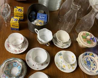 Collection of vintage china teacups and saucers.