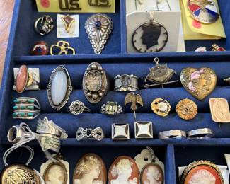 Hundreds of smalls/historical memorabilia and jewelry, including a number of antique cameos, sterling rings, and many signed/designer costume pieces.