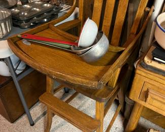 Vintage high chair; vintage ladles.
