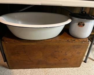 Antique wood chest; vintage enamelware.