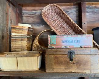 Numerous vintage crates, wood boxes, and baskets.