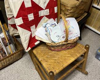 Vintage rocking chair with cane-like seating; vintage quilt (one of a few to be sold).