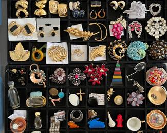 1,000+ smalls and jewelry, including many designer/signed jewelry pieces, miniature perfume bottles, interesting smalls, and more.