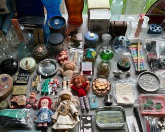 Hundreds of “smalls” (small collectibles), including paperweights, antique/vintage fish bottles, dolls, tins, and much more.