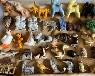 Collection of miniature figurines from throughout the 20th century.