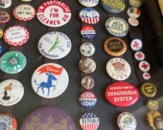 Large collection of vintage pinbacks/buttons, including many political, advertising, etc.