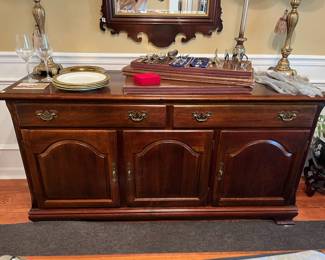 #2	Crescent Pennsylvania Cherry Buffet table. 2 drawers, 3 doors, 1 shelf. Felt inlay drawers. 62"x 19.5"x32"	 $ 175.00 																							