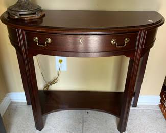 #26	Gordon's cherry entry table, chippendale style. 1 drawer, 1 shelf. 36"x14"29.5"	 $ 120.00 																							