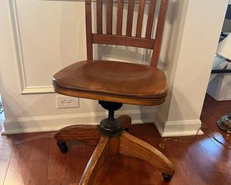 #15	Oak vintage office rolling chair adjustable. 17"x15"seat Depth.x33"	 $ 100.00 																							