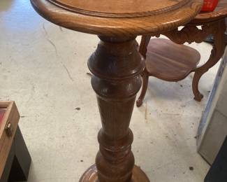 This is a beautiful walnut plant stand.