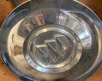 A vintage Buick hubcap