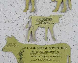 Back of De Laval Tin Cows & Calf