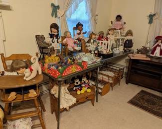 Vintage baby dolls, cribs, cradles, chairs and benches.