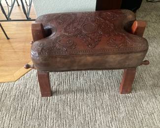 Etched leather camel saddle stool/ottoman