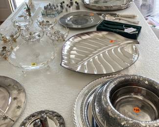 Various silverplate serving plates and  trays, glass tiramisu serving dishes with handles