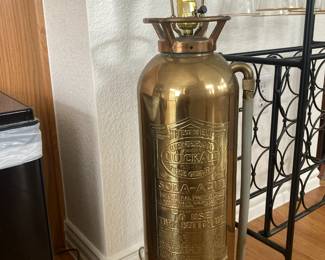 Brass fire extinguisher made into a table lamp