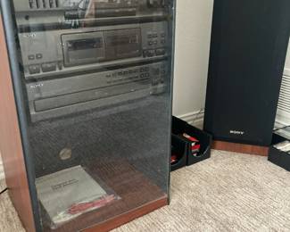 Sony stereo system in cabinet with speakers
