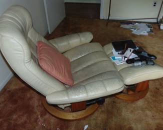 Vintage leather chair and matching ottoman.