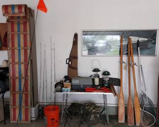 target throwers, gun cases, fishing rods, nets, tackle, 7’ Olympia toboggan, hard golf club case, Coleman lanterns, ice fishing