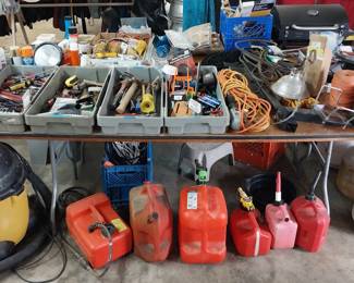 shop vac, fuel cans, propane tanks, hand tools