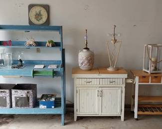 kitchen/garden carts, hurricane lamp, cane chair
