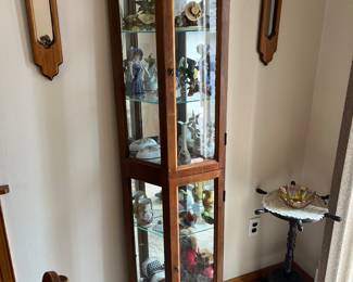 Slim curio with collectibles…zoom in to check them out! 