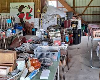 Barn filled with tools, equipment and supplies.