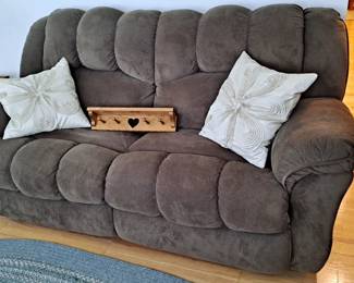 Sofa; Decorator Pillows; and Wood Shelf with Pegs
