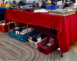 Large Braided Area Rug; Assortment of VHS Tapes including Disney selection; LP's; CD's, Cassettes; Head Phones, Radios and much more!