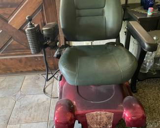 Motorized wheelchair.  Needs new battery. Local repairman name on request