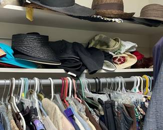 Hats & one of 5 racks of clothes