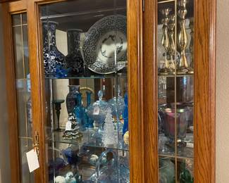 curio cabinet, blue glass