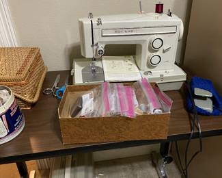 sears sewing machine & few notions