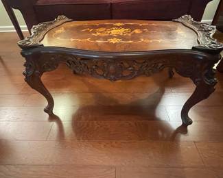 Carved antique coffee table.