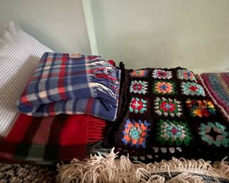 Vintage quilts and afghans.